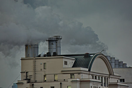 Smoking chimneys of a Moscow thermal power station in the city center.