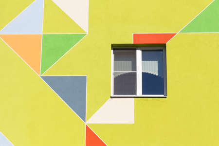 Modern, bright, colorful architecture on a cloudless and sunny dayの写真素材