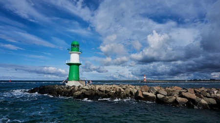 lighthouses on warnemuende river mouthの写真素材
