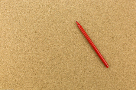 red marker on cork boardの写真素材