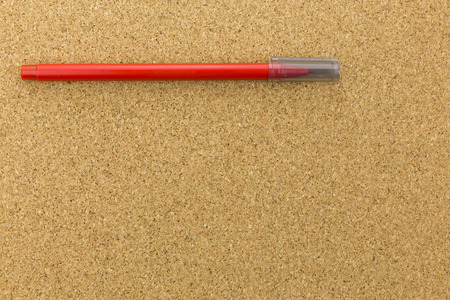 red marker on cork boardの写真素材
