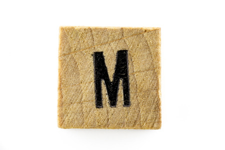 Wooden alphabet blocks with letters M (Isolated)の写真素材