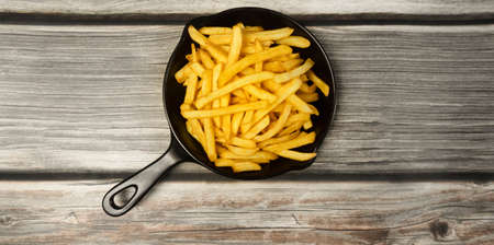 French fries on mini black pan.の写真素材