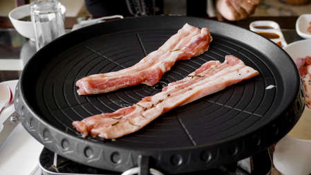 Belly pork on grill pan, Korean food.の写真素材
