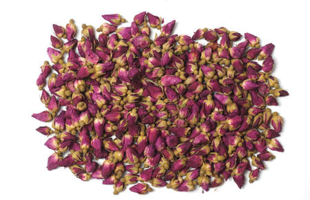Pile of dried rose on white background.の写真素材