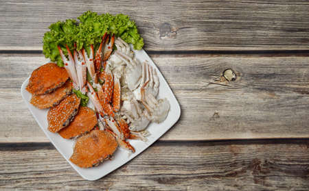 Steamed crabs with spicy seafood sauce.の写真素材