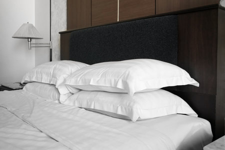 Close up white pillows on the bed.の写真素材