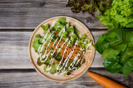 Top view fresh vegetables salad on wooden table.の写真素材