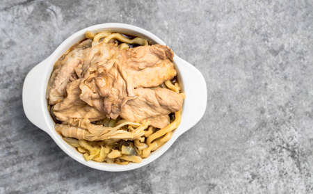 Japanese udon noodles with sliced pork.の写真素材