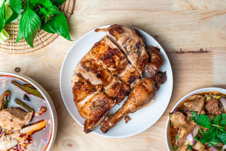 Top view Thai-Isan food on wooden table.の写真素材