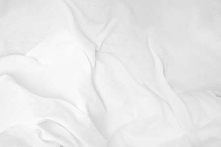 White fabric texture, crumpled blanketの写真素材
