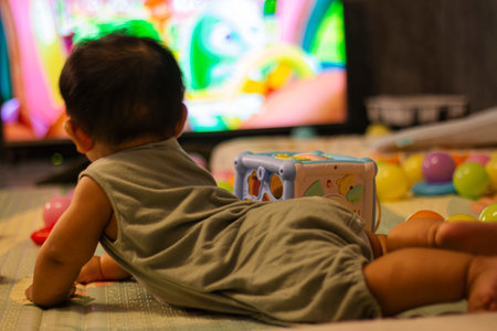 Baby In Bodysuit Is Crawling On A Soft Mat.の写真素材