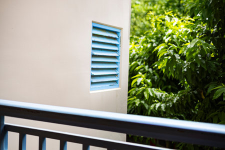 Blue Wooden Ventilation Vents On Building Walls, Background for advertising and wallpaper in...