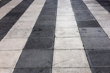 Repeating Pattern On Walkway Floor, Repeating pattern on a walkway floor highlights intricate...
