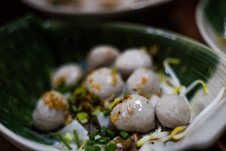 Beef Meatball Noodles In Bowl, A sizzling ad photo of beef meatball noodles steaming in a bowl,...