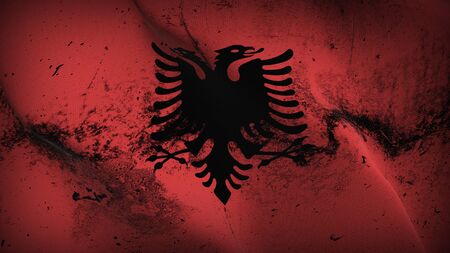 Albania grunge flag waving on wind. Albanian dirty background fullscreen flag blowing on wind. Realistic fabric texture on elevator day.の写真素材