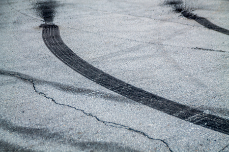 burnt rubber traces on asphaltの写真素材