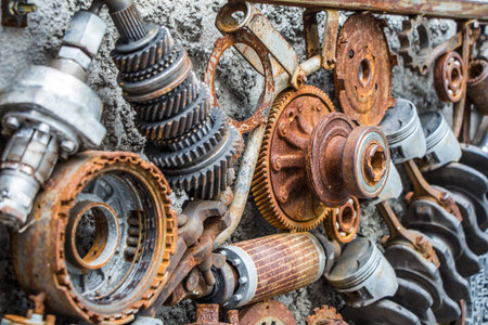 metal vintage machinery and engine parts gathered in patterns as a steampunk background