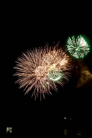Beautiful sparks from fireworks in the sky at night.の写真素材
