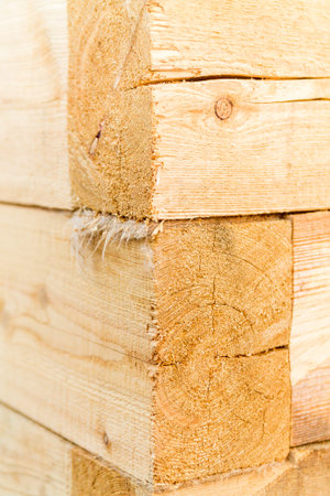 Vertical Banner with New light orange timber. Sauna building edge exterior. A Wooden texture...
