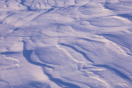 Snow winter texture background in very peri trendy violet color of the Yearの写真素材