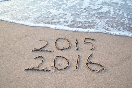 Happy New Year 2016 will replace the 2015 concept on the sea beachの写真素材