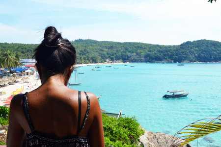 Young fashion woman relax on the beachの写真素材