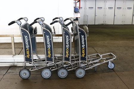 LAX, CA-7 October 2016-Editorial: SmarteCarte paying luggage carts await passengers at many airports throughout the United Statesのeditorial素材