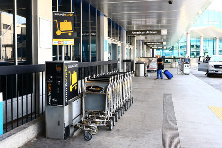 LAX, CA-7 October 2016-Editorial: SmarteCarte paying luggage carts await passengers at many airports throughout the United Statesのeditorial素材