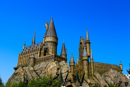 OSAKA, JAPAN-APR 12, 2019: Photo of Hogwarts School of Witchcraft and Wizardry replica at The Wizarding  , Universal Studios Japan.Panorama view, Toned Photo.のeditorial素材