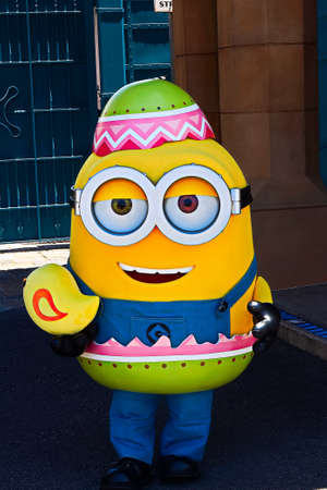 OSAKA, JAPAN - June 17, 2020 : Statue of HAPPY MINION easter version in Universal Studios Japan.Minions are character from Despicable Me animation.のeditorial素材