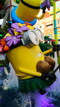 OSAKA, JAPAN - Nov 13, 2019 : Close up of HAPPY MINION statue in Universal Studios Japan. Minions are famous character from Despicable Me animation.のeditorial素材