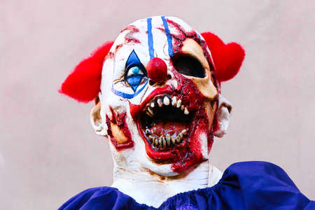 Close up Halloween party horror clown. The scary clown standing.closeup of a scary evil clown.closeup of a scary evil clown.の写真素材