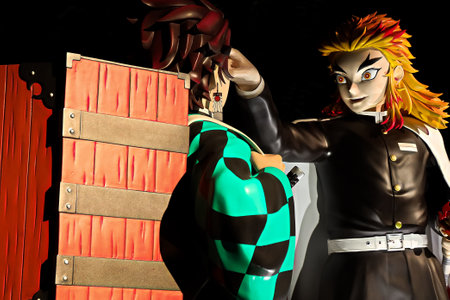 Osaka,Japan - Nov 5,2021 : Statue of Kyojuro Ren and Tanjiro Kamado : Demon Slayer ("Devil's Blade" Kimetsu no Yaiba) character at Universal Studios Japan.のeditorial素材