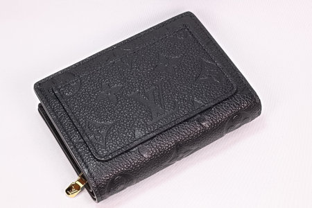 OSAKA,JAPAN - AUG 12,2023 : Louis Vuitton UNISEX Black leather wallet "Portefeuille crea" isolated on white backgroundのeditorial素材