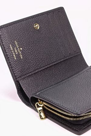 OSAKA,JAPAN - AUG 12,2023 : Louis Vuitton UNISEX Black leather wallet "Portefeuille crea" isolated on white backgroundのeditorial素材