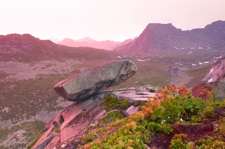Hanging stone in Ergaki ridge under the sunsetの写真素材