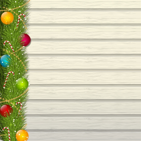Christmas tree branches on wooden backgroundの写真素材