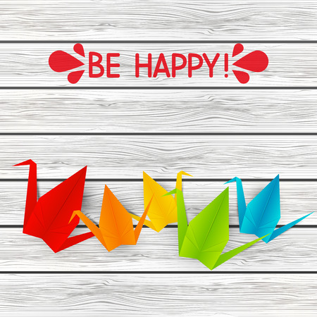 Paper origami cranes on wooden backgroundのイラスト素材