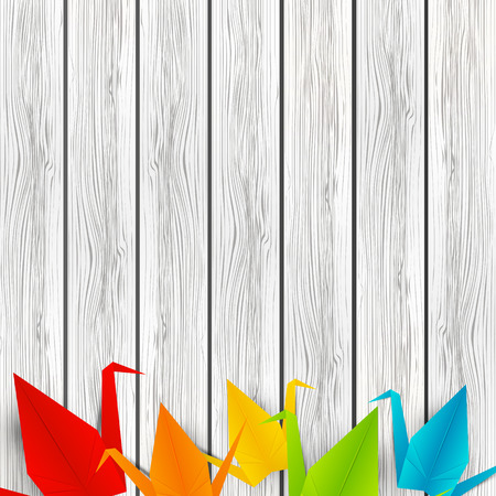 Paper origami cranes on wooden backgroundのイラスト素材