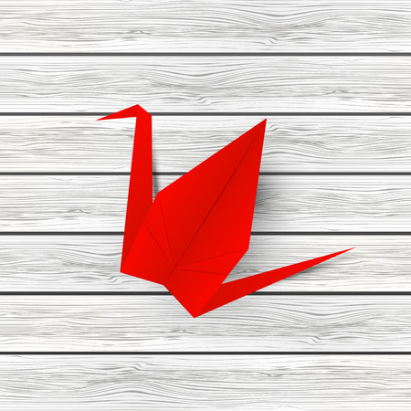 Paper origami crane on wooden backgroundのイラスト素材