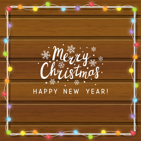 Christmas light bulbs on wooden backgroundのイラスト素材
