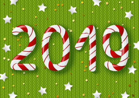 New Year concept - 2019 candy numbers on green