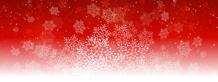 Winter snowflakes on red background - horizontal panoramic banner for Christmas and New Year holiday designの写真素材