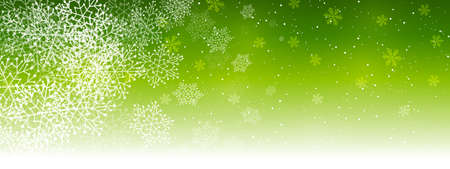 Winter snowflakes on green background - horizontal panoramic banner for Christmas and New Year holiday designの写真素材