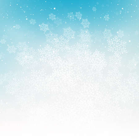 Christmas background with winter snowflakes on blueの写真素材
