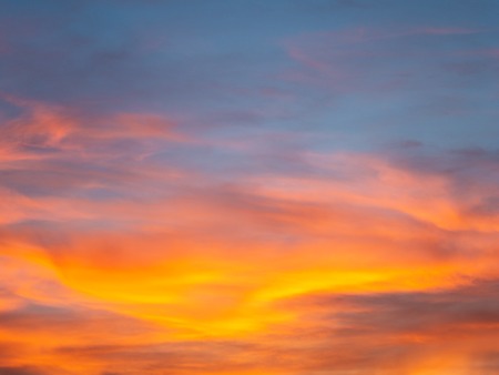 Image of beautiful sunset with colorful clouds in the eveningの写真素材