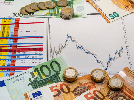 Image of money investment strategy with coins and euro bills close upの写真素材