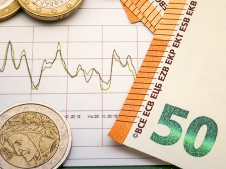 Image of money investment strategy with coins and euro bills close upの写真素材