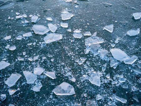 Image of crushed ice on frozen lake in the winter. close upの写真素材